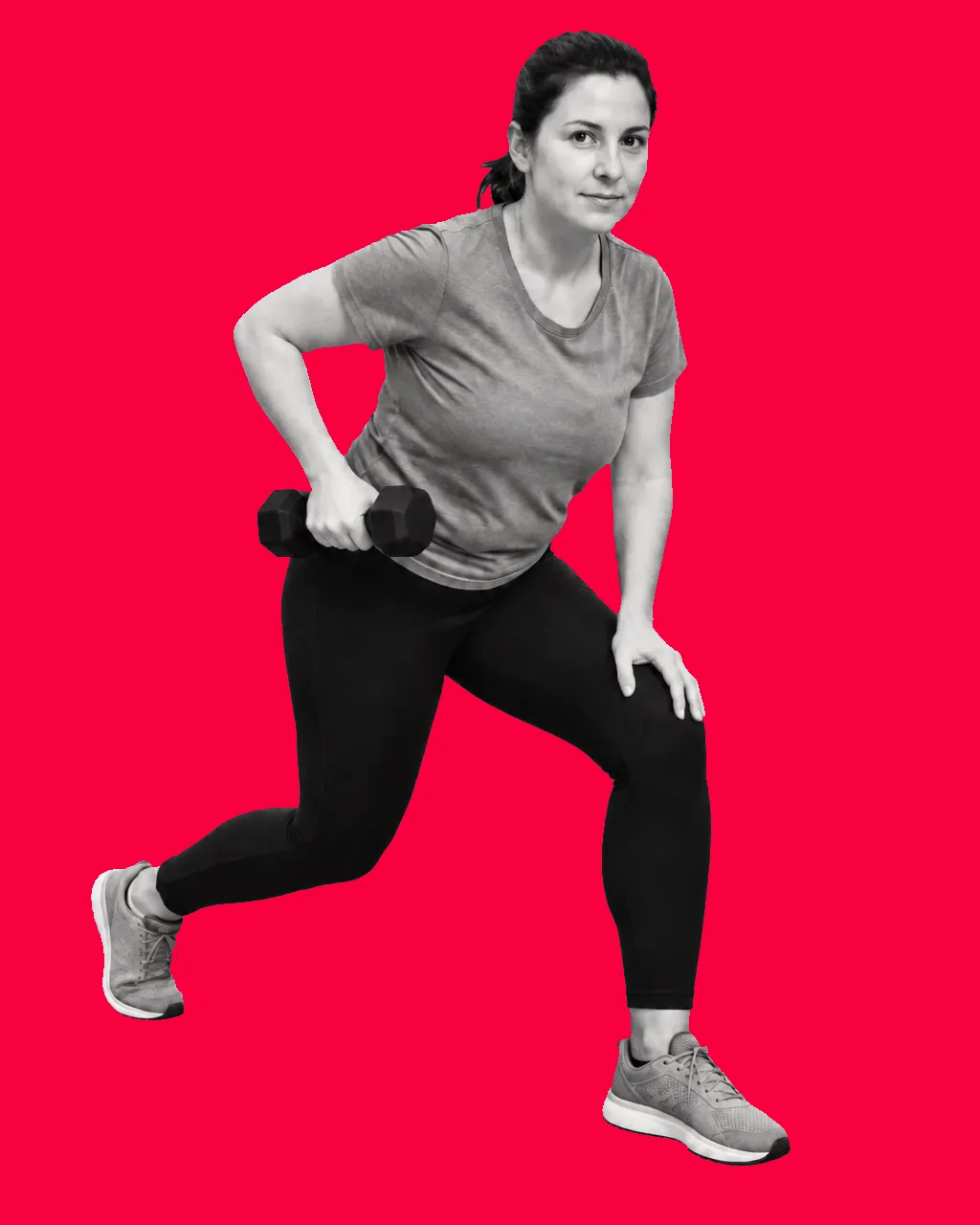 Everyday woman performing a split squat with a dumbbell